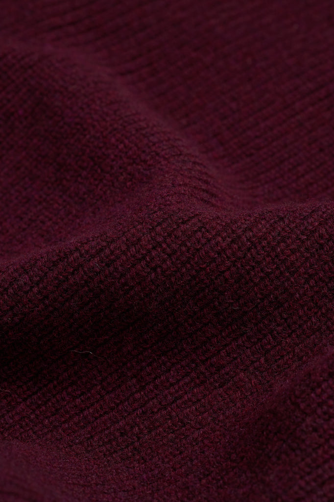 Raglan Merino Sweater - Dark Heather Purple — flat lay, macro